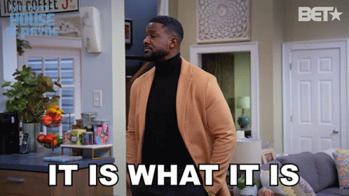 Man In Living Room Saying It Is What It Is GIF