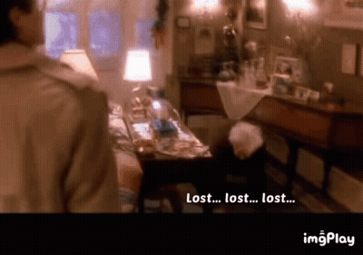 Man In Living Room Saying Lost GIF