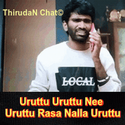 Man In Local Shirt Talking On Phone GIF