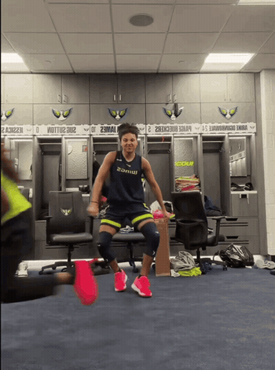 Man In Locker Room Wearing 2Amw Shirt GIF