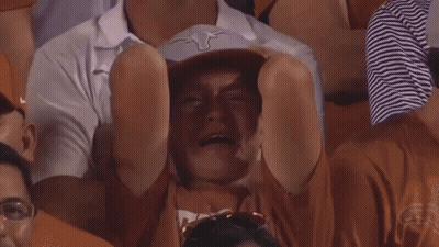 Man In Longhorn Hat Crying In Crowd GIF