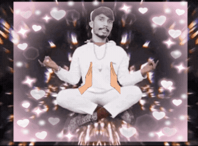 Man In Lotus Position With Folded Hands GIF