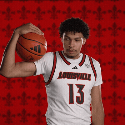Man In Louisville Jersey Holding Basketball GIF