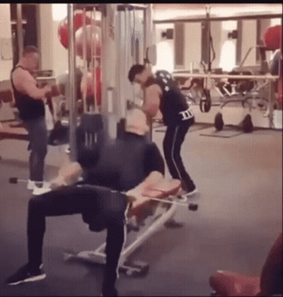 Man In M&Ms Jersey Lifting Weights GIF