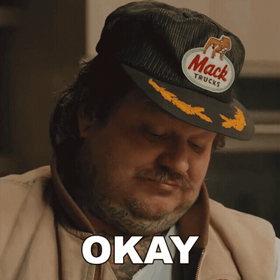 Man In Mack Truck Hat Saying Okay GIF