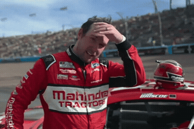 Man In Mahindra Tractors Jacket Wiping Face GIF