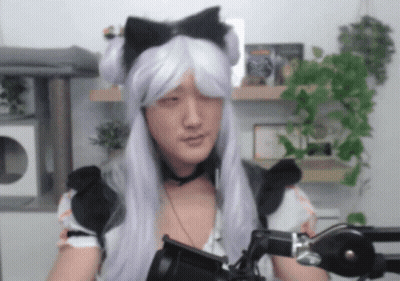 Man In Maid Costume Eyes Closed At Microphone GIF