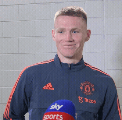 Man In Manchester United Jacket Smiling GIF