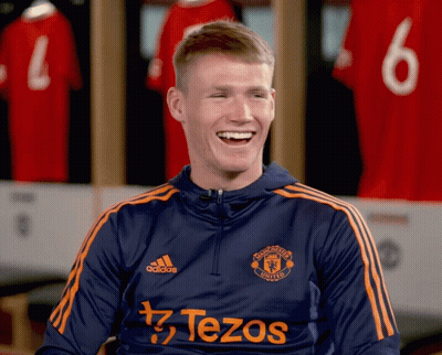 Man In Manchester United Shirt Laughs GIF