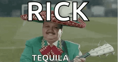 Man In Mariachi Outfit Holding Guitar GIF