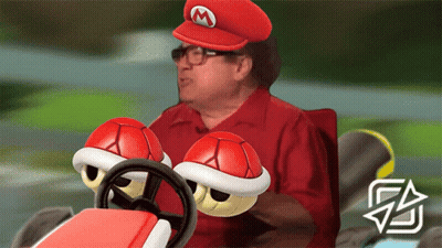 Man In Mario Hat Driving Red Car GIF