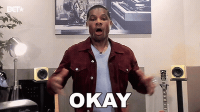 Man In Maroon Jacket Saying Okay GIF