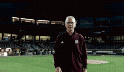 Man In Maroon Jacket With Letter M GIF