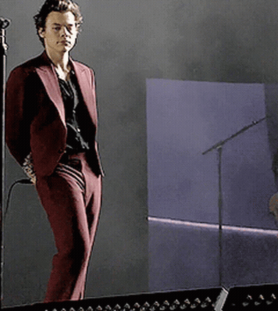 Man In Maroon Suit At Microphone GIF