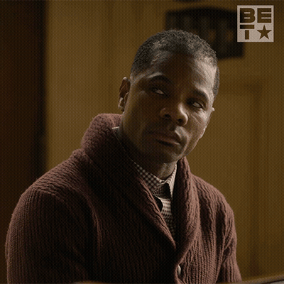 Man In Maroon Sweater And Plaid Shirt With BET Logo GIF