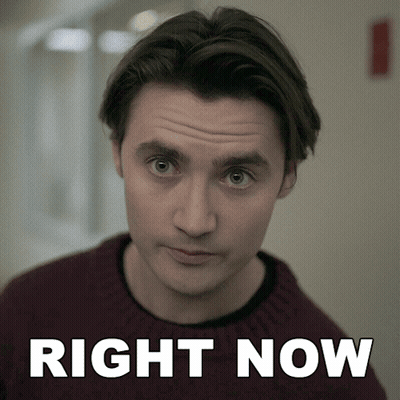 Man In Maroon Sweater Before Right Now Sign GIF