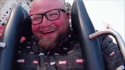 Man In Marvel Shirt Smiling GIF