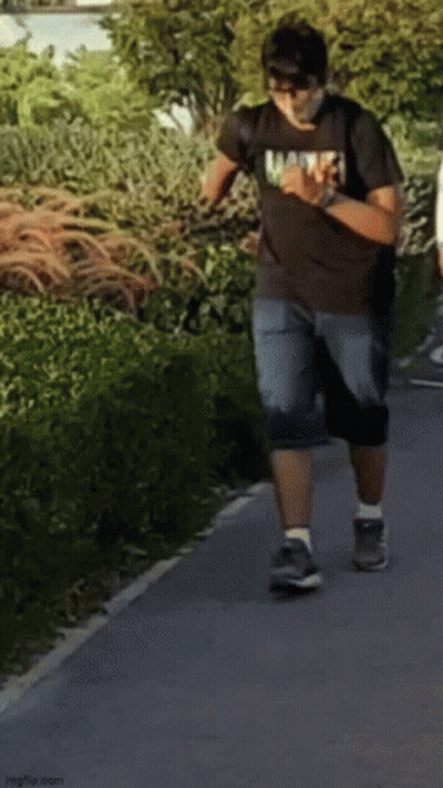 Man In Marvel T-Shirt Walking GIF