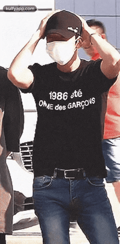 Man In Mask And 1986 T-Shirt GIF