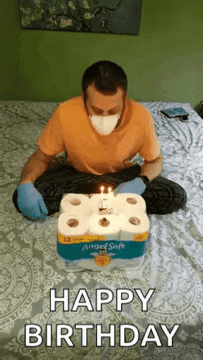 Man In Mask And Gloves Celebrating Birthday With Toilet Paper GIF