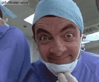 Man In Mask And Gloves Making Funny Face GIF