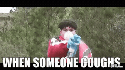Man In Mask And Gloves Pointing Gun GIF