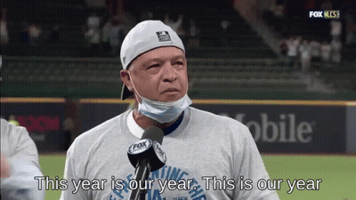 Man In Mask And Hat Saying This Year Is Our Year GIF