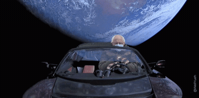 Man In Mask And Mittens Driving Car In Space GIF