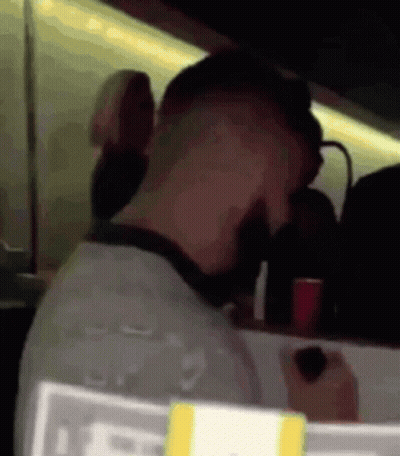 Man In Mask And Sunglasses On Race Track GIF