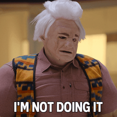 Man In Mask And Vest Saying I'm Not Doing It GIF