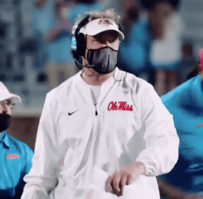 Man In Mask And White Jacket Ole Miss GIF