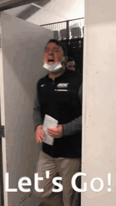Man In Mask At Doorway Saying Let's Go GIF