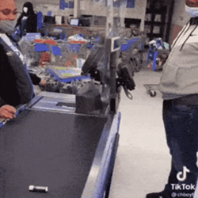 Man In Mask At Grocery Store Cash Register GIF