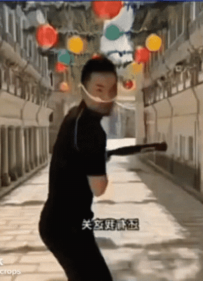 Man In Mask Holding Baseball Bat In Hallway GIF