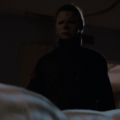 Man In Mask Holding Knife GIF