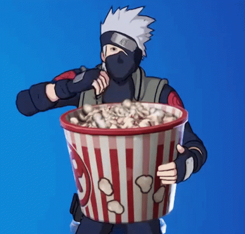 Man In Mask Holding Popcorn Bucket GIF