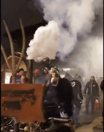 Man In Mask Next To Freedom Sign GIF