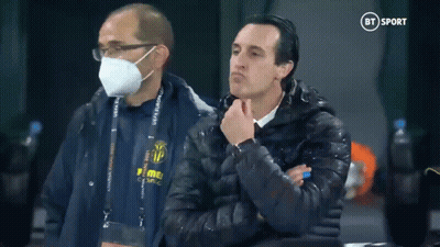 Man In Mask Next To Man In Puma Jacket GIF