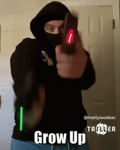 Man In Mask Pointing Gun Saying Grow Up GIF