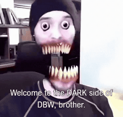 Man In Mask Sitting In Chair Talking GIF