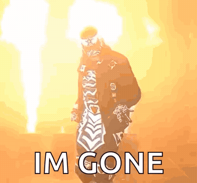 Man In Mask Standing In Front Of Fire Saying Im Gone GIF