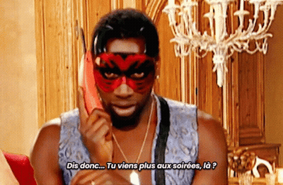 Man In Mask Talking On Phone Saying Dis Donc Tu Viens Plus Aux Soirées GIF