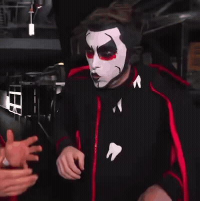 Man In Mask With A And Man In Cape GIF