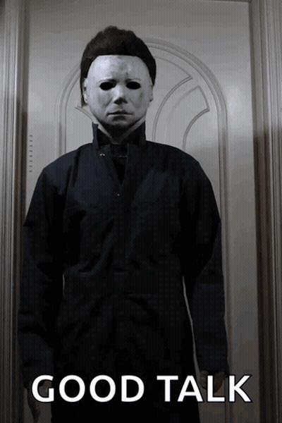 Man In Mask With Good Talk Above GIF