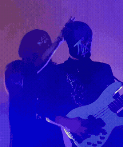 Man In Mask With Letter T GIF