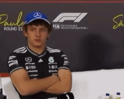 Man In Mercedes Hat Arms Crossed GIF