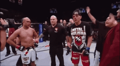 Man In Metal Hulisha Shirt In Ring GIF