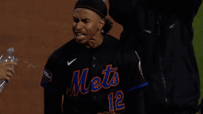 Man In Mets Jersey Holding Water Bottle GIF