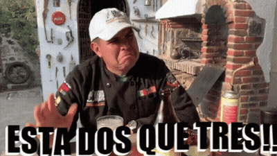 Man In Mexico Sweatshirt In Front Of Vehicles GIF