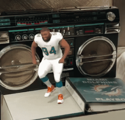 Man In Miami Dolphins Jersey Dancing In Front Of Boom Box GIF